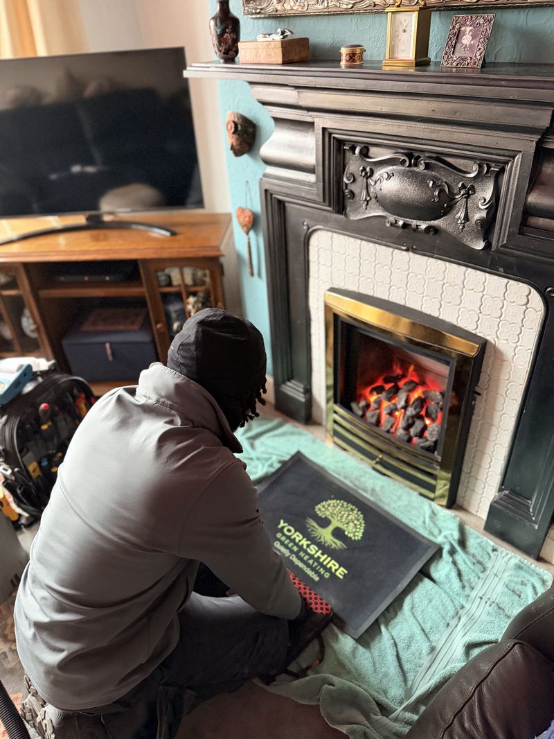 Gas Safe engineer servicing a gas fire in Doncaster