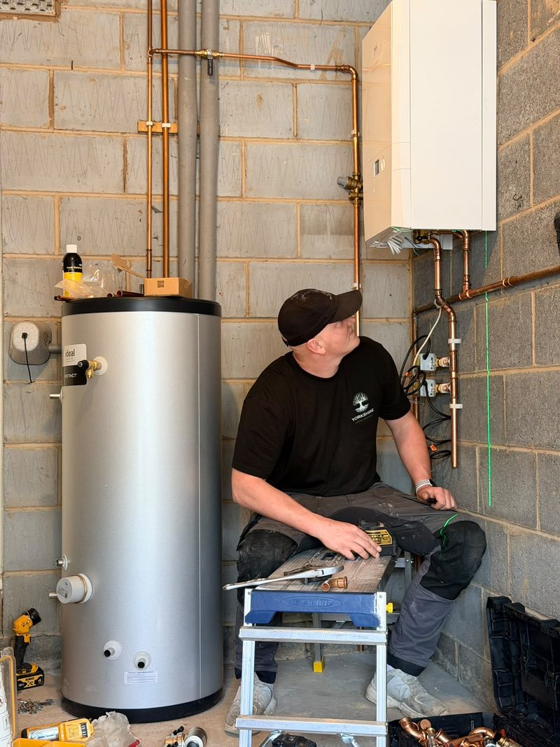 Ashley installing an Ideal boiler and unvented cylinder